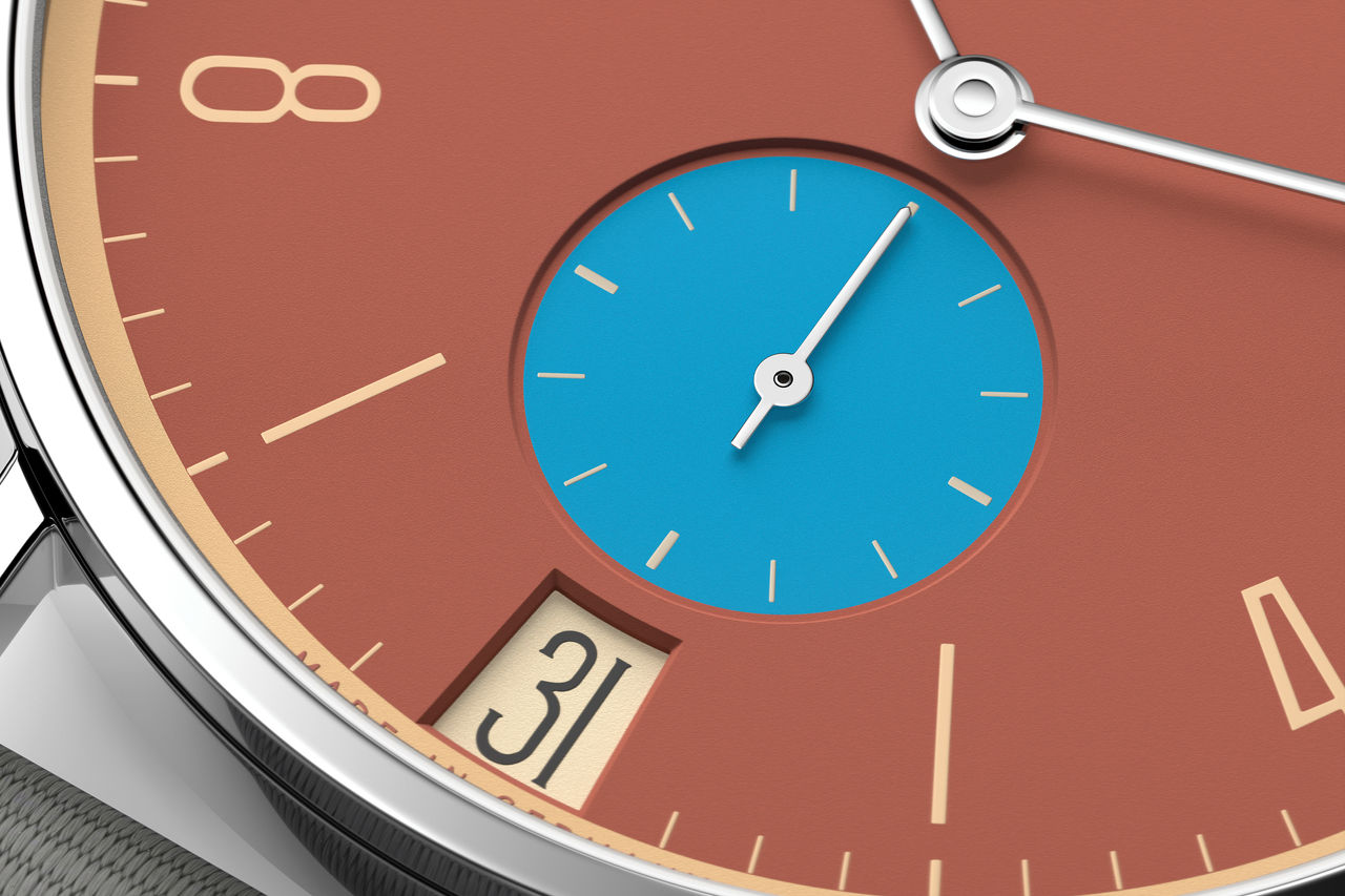 nomos_tangente-38-datum-ziegelblau-06.jpg